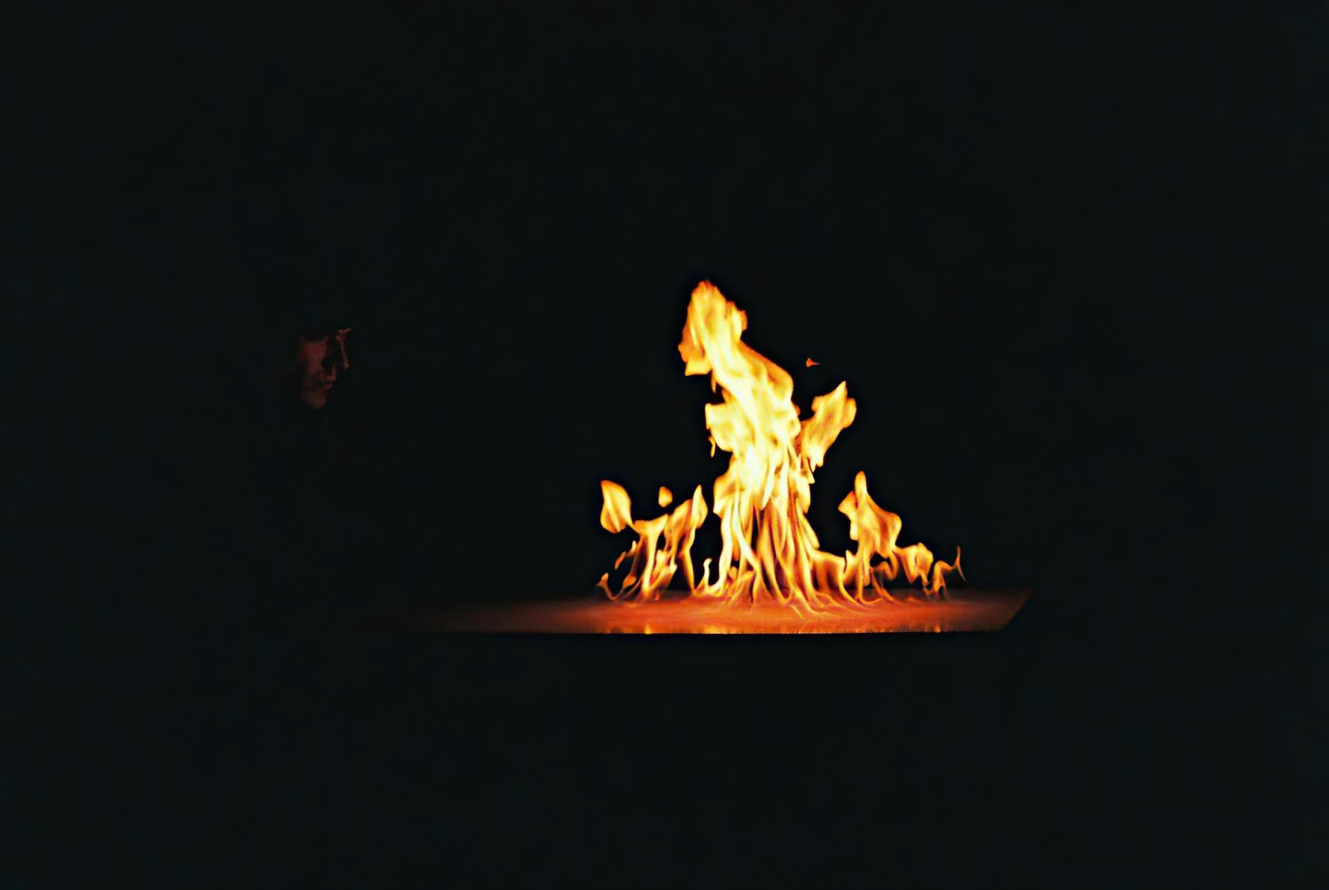 A person gazing in a fire