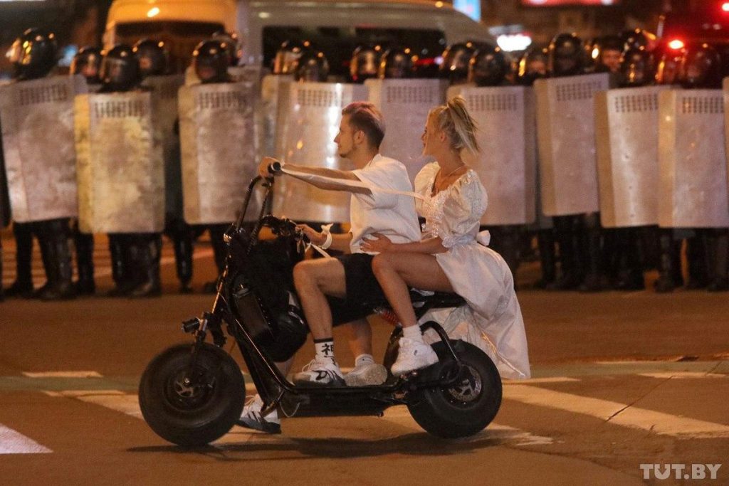 Man and woman on a motorbike